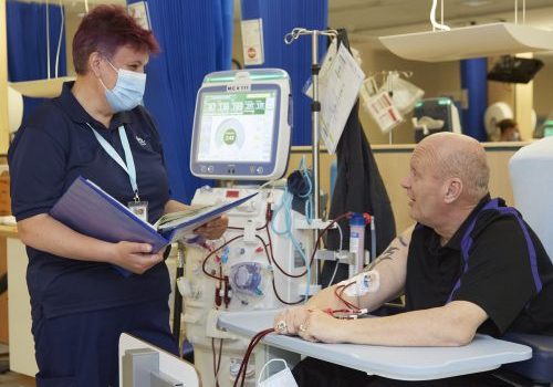 Rachel Cox with patient Guy Hunter