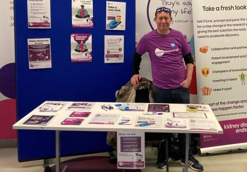 Andrew hosting an awareness raising stand in his local hospital