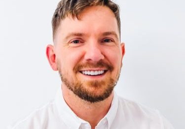 A portrait photo of researcher Dr Stuart Stewart