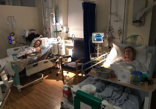 Natalie May and Nicola Two sisters in hospital bed next to each other.