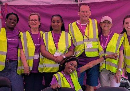 Group of seven volunteers wearing high vis at London Bridges Walk